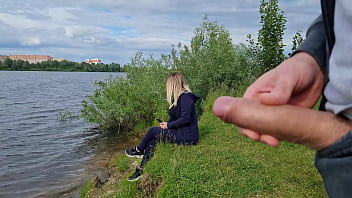 Amateur man exposes himself to unsuspecting girl in nature, leading to mutual arousal and climax