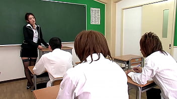 A seductive Japanese instructor performs oral sex on her pupils before engaging in a risqué encounter at a hospital